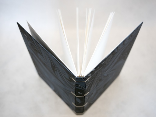 La reliure secrète belge ou "criss-cross"